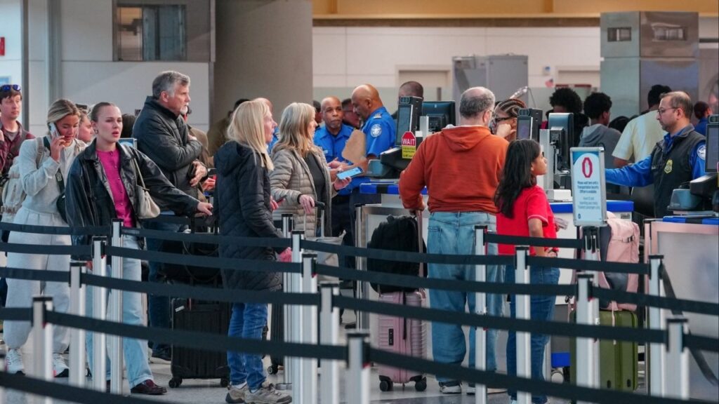 Passengers walk through a queue to enter a TSA security checkpoint at Ronald Reagan International Airport in Arlington, Virginia., U.S., March 15, 2026. (Reuters/Aaron Schwartz)