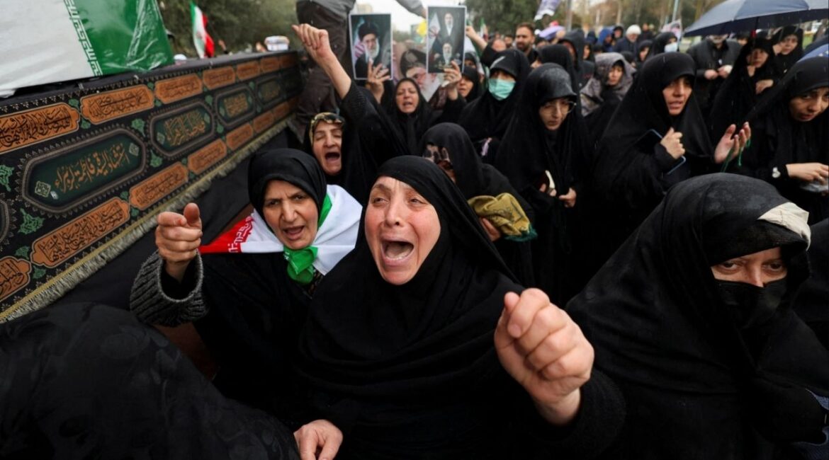 People attend the funeral of Intelligence Minister Esmail Khatib at Tehran's Grand Mosque, known as the Grand Prayer Hall, amid the U.S.-Israeli conflict with Iran, in Tehran, Iran, March 20, 2026. (Reuters/Alaa Al-Marjani)