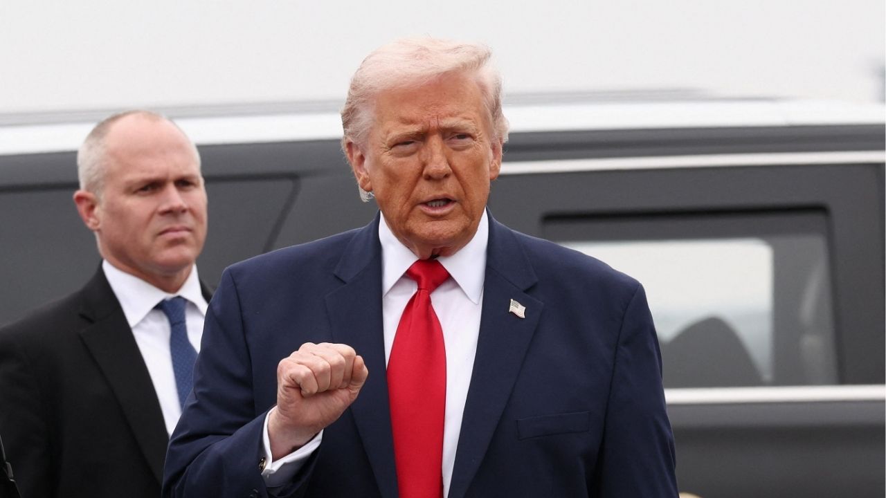 President Donald Trump gestures as he arrives for a dignified transfer ceremony, in Dover, Delaware, U.S., March 7, 2026. (Reuters/Kevin Lamarque)