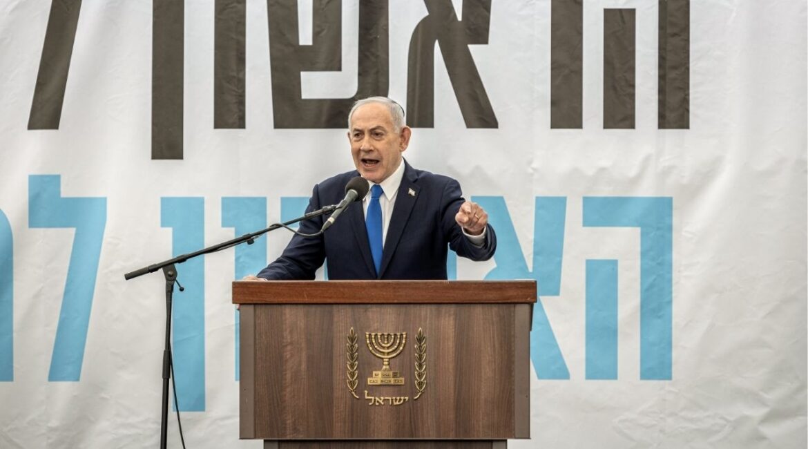 Prime Minister Benjamin Netanyahu of Israel delivers a speech at the funeral of an Israeli hostage, in Meitar, Israel, Jan. 28, 2026. Rebuffing pressure from President Donald Trump, a key Israeli legal office says the prime minister should be granted a pardon in his long-running trial on corruption charges only if he resigns, confesses or is convicted. (Avishag Shaar-Yashuv/The New York Times)