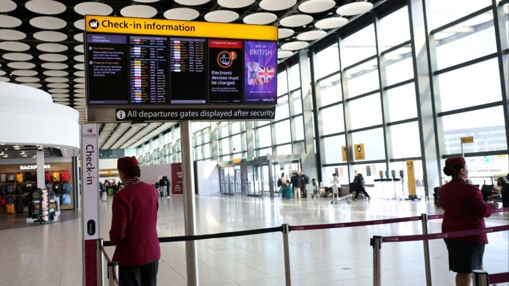 Qatar airline staff stand by a departure board displaying cancelled flights to Middle East countries amid the U.S.-Israel conflict with Iran, at Heathrow Airport Terminal 4, in Greater London, Britain, March 2, 2026. (Reuters File)