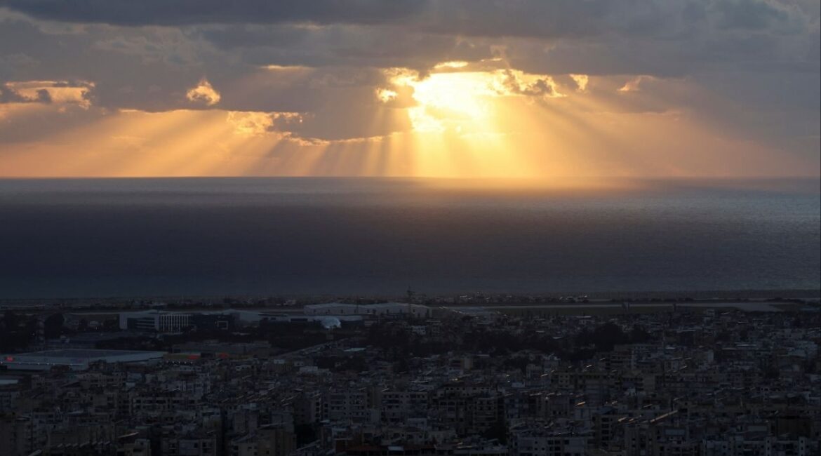 Rays of sunlight break through a cloud over Beirut's southern suburbs, amid escalating hostilities between Israel and Hezbollah, as the U.S.-Israel conflict with Iran continues, Lebanon, March 30, 2026. (Reuters/Amr Abdallah Dalsh)