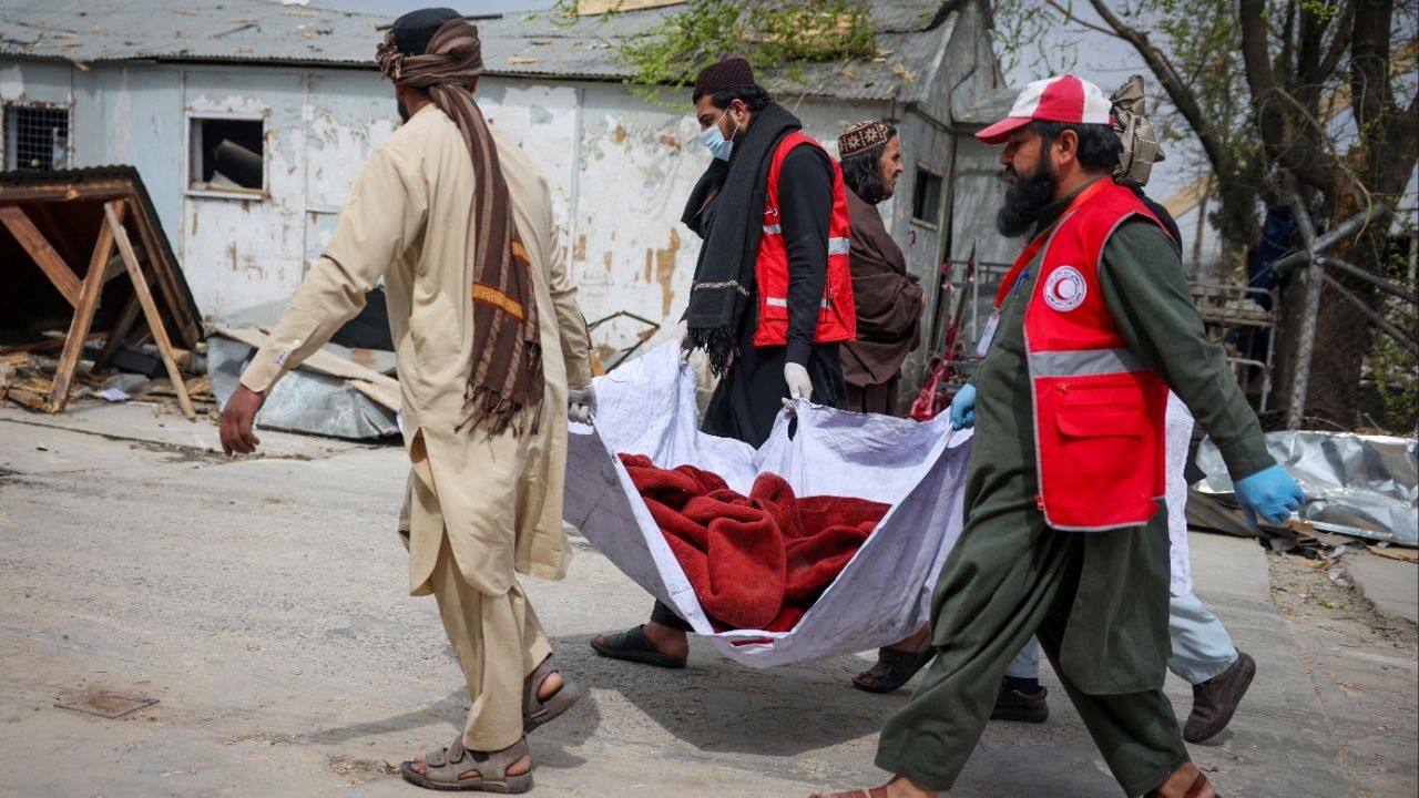 Red Crescent volunteers carry a body of a victim, who died in what the Taliban said was a Pakistani air strike on a drug users rehabilitation hospital, in Kabul, Afghanistan, March 17, 2026. (Reuters/Sayed Hassib)