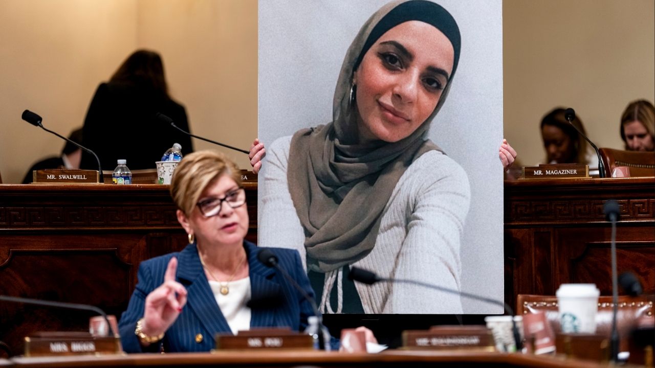 Rep. Nellie Pou (D-N.J.) speaks as an aide holds a photo of Leqaa Kordia during a House Homeland Security Committee hearing on Capitol Hill in Washington, Feb. 10, 2026. Kordia, who took part in pro-Palestinian demonstrations at Columbia University in 2024, has been released from a federal detention center in Texas, where she had been held for more than a year. (Eric Lee/The New York Times)