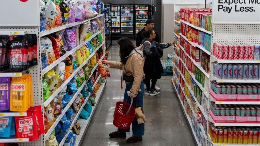 Shoppers at a Target in midtown Manhattan, Nov. 5, 2025. Target plans to spend $2 billion to revamp stores to attract more shoppers as part of a turnaround plan under a new chief executive who’s trying to pull the retailer out of a lengthy sales slump. (Hiroko Masuike/The New York Times)