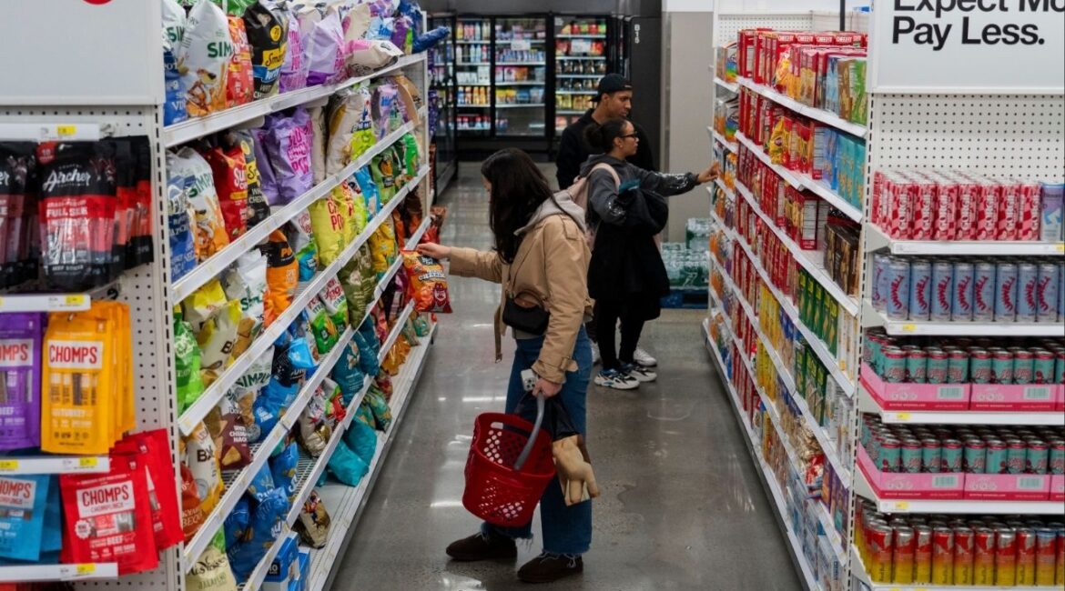 Shoppers at a Target in midtown Manhattan, Nov. 5, 2025. Target plans to spend $2 billion to revamp stores to attract more shoppers as part of a turnaround plan under a new chief executive who’s trying to pull the retailer out of a lengthy sales slump. (Hiroko Masuike/The New York Times)