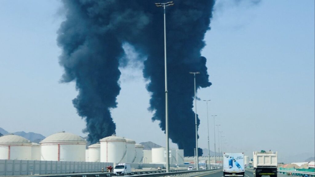Smoke rises in the Fujairah oil industry zone, caused by debris after interception of a drone by air defenses, according to the Fujairah media office, amid the U.S.-Israel conflict with Iran, in Fujairah, United Arab Emirates, March 14, 2026. REUTERS/Staff