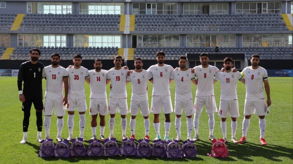 Soccer Football - International Friendly - Iran v Nigeria - Mardan Sports Complex, Antalya, Turkey - March 27, 2026 Iran players line up before the match as school bags are laid in memory of the victims of the girls school bombing in Minab, Iran (Reuters/Umit Bektas)