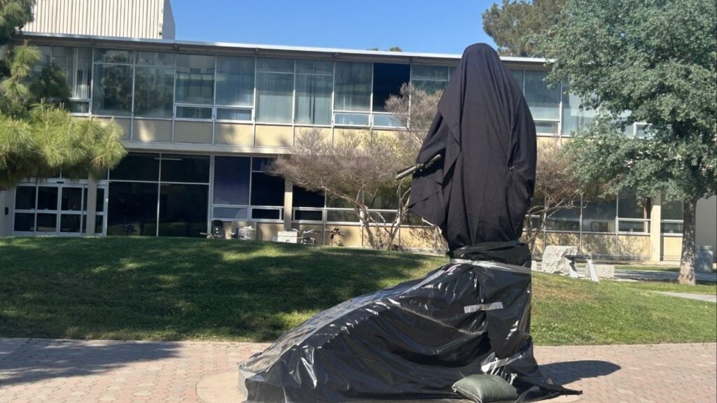 The Cesar Chavez statue at Fresno State was covered on Wednesday, March 18, 2026. (GV Wire/Anya Ellis)