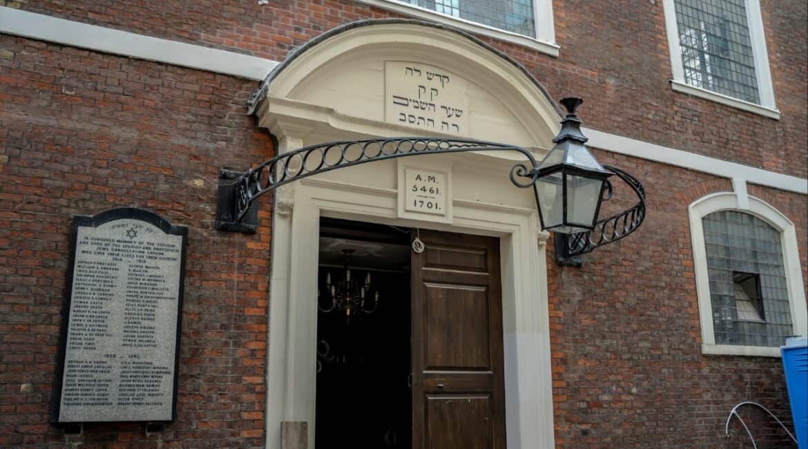 The entrance of the Bevis Marks Synagogue, which is more than 300 years old, in London, Aug. 26, 2021. Two men are accused of carrying out “hostile surveillance” of Israeli and Jewish institutions in England, including on Britain’s oldest synagogue, on behalf of Iran’s intelligence service, according to charges presented at a court hearing on Thursday. (Andrew Testa/The New York Times)
