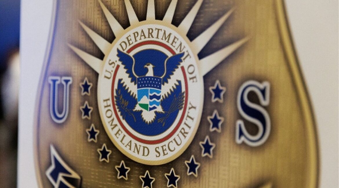 The seal of the U.S. Department of Homeland Security is printed on a sign during a U.S. Immigration and Customs Enforcement (ICE) two-day job fair in Texas to help fill vacancies for deportation officers and attorneys, in Arlington, Texas, U.S. August 26, 2025. (Reuters File)