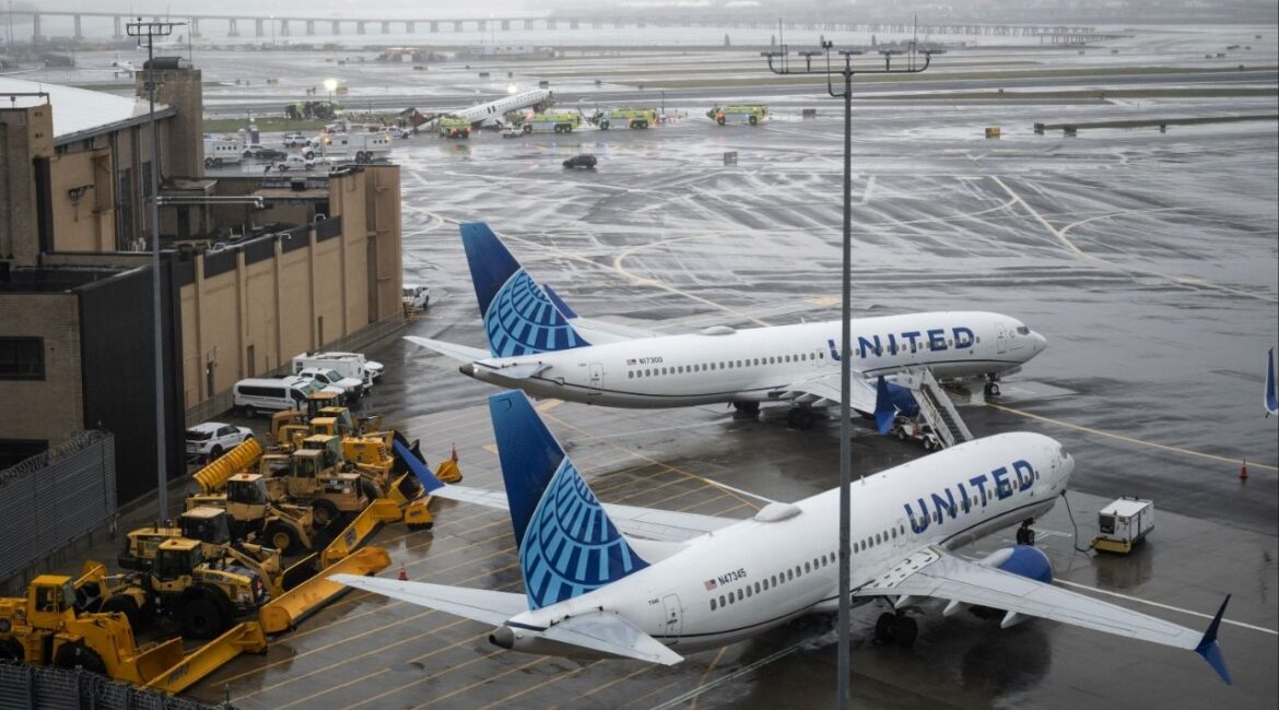The wreckage of an Air Canada regional jet and a Port Authority fire truck on the runway at LaGuardia Airport in Queens, on Monday, March 23, 2026. A runway collision at New York’s LaGuardia Airport late Sunday killed two people, injured dozens more and shut down one of the busiest domestic airports in the region. (Victor J. BLue/The New York Times)