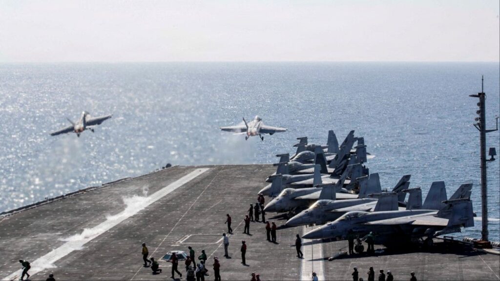 Two F/A-18 Super Hornets launch from the flight deck of the U.S. Navy Nimitz-class aircraft carrier USS Abraham Lincoln in support of the Operation Epic Fury attack on Iran from an undisclosed location March 3, 2026. (Reuters File)