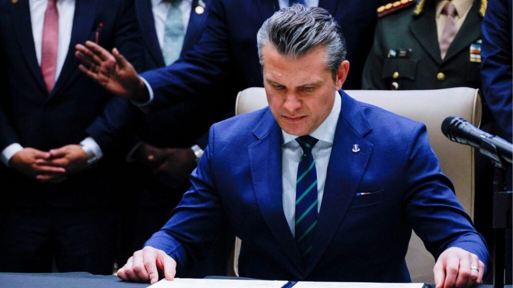 U.S. Secretary of Defense Pete Hegseth looks at the signed joint security agreement at the inaugural Americas Counter Cartel Conference with regional defense and security leaders at U.S. Southern Command headquarters in Doral, Florida, U.S., March 5, 2026. (Reuters File)