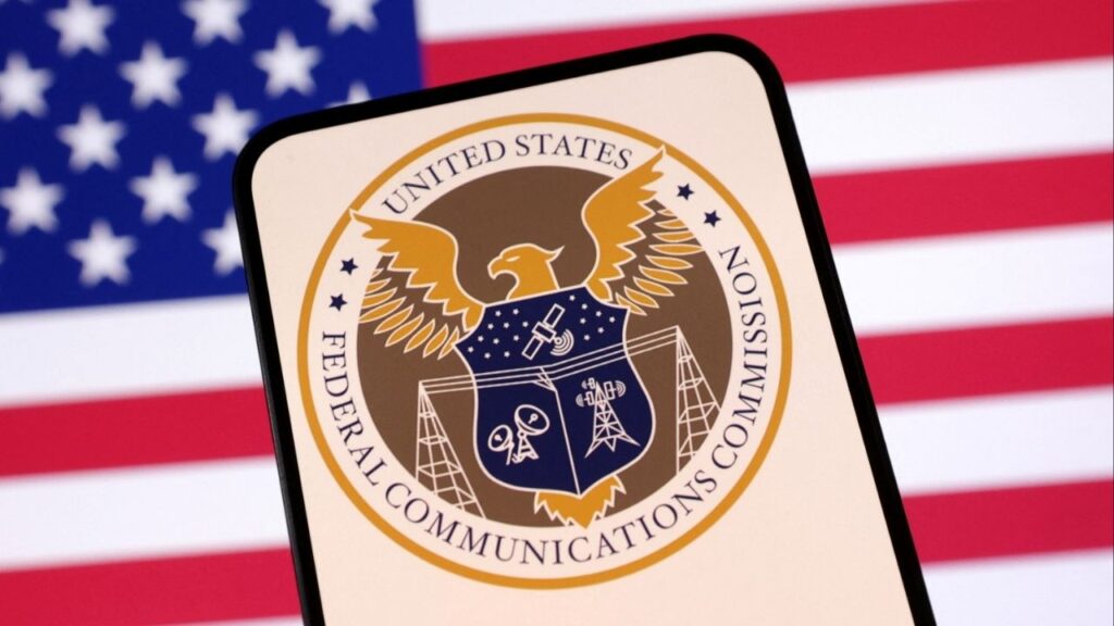 United States Federal Communications Commission logo and U.S. flag are seen in this illustration taken April 23, 2025. REUTERS/Dado Ruvic/Illustration