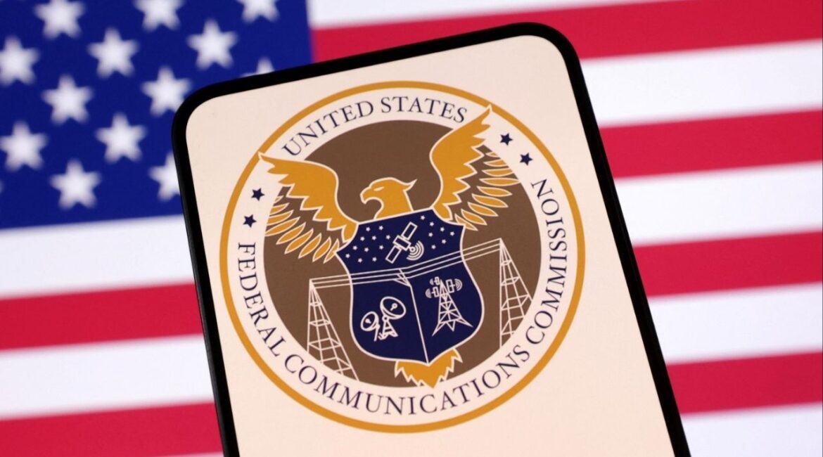 United States Federal Communications Commission logo and U.S. flag are seen in this illustration taken April 23, 2025. REUTERS/Dado Ruvic/Illustration