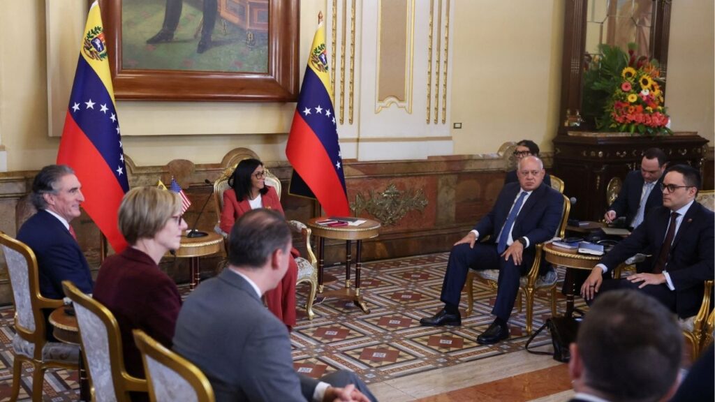 Venezuela's interim President Delcy Rodriguez meets with U.S. Interior Secretary Doug Burgum, with Venezuela's Interior Minister Diosdado Cabello sitting in the room, in Caracas, Venezuela, March 4, 2026. (Reuters/Leonardo Fernandez Viloria)