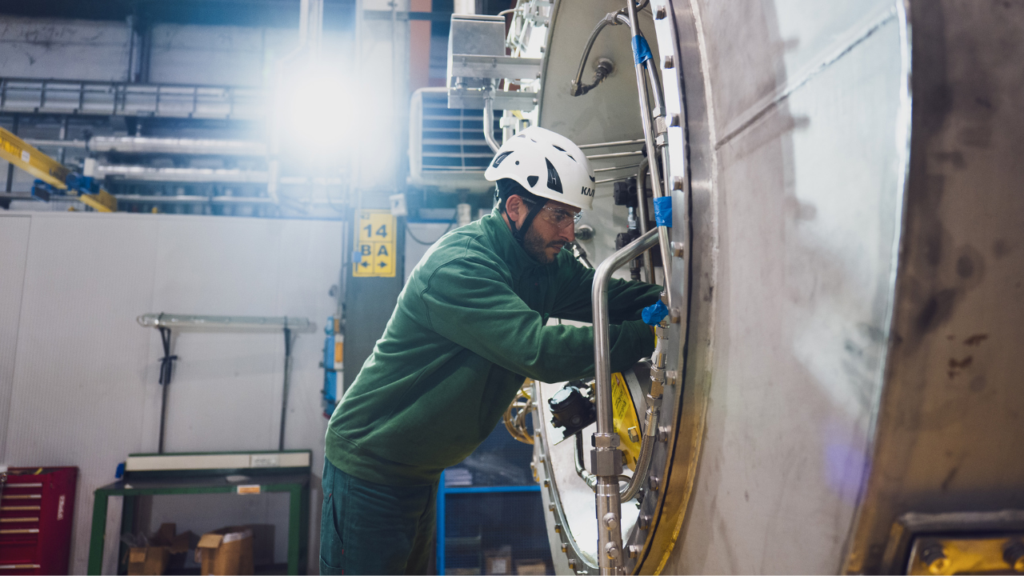 A worker at a factory in Florence, Italy, owned by Baker Hughes, an oil field service company that makes the kinds of turbines being used off grid, Nov. 26, 2025. Seeking power for data centers, Meta and other companies plan to use equipment that is expensive and polluting. (Clara Vannucci/The New York Times)