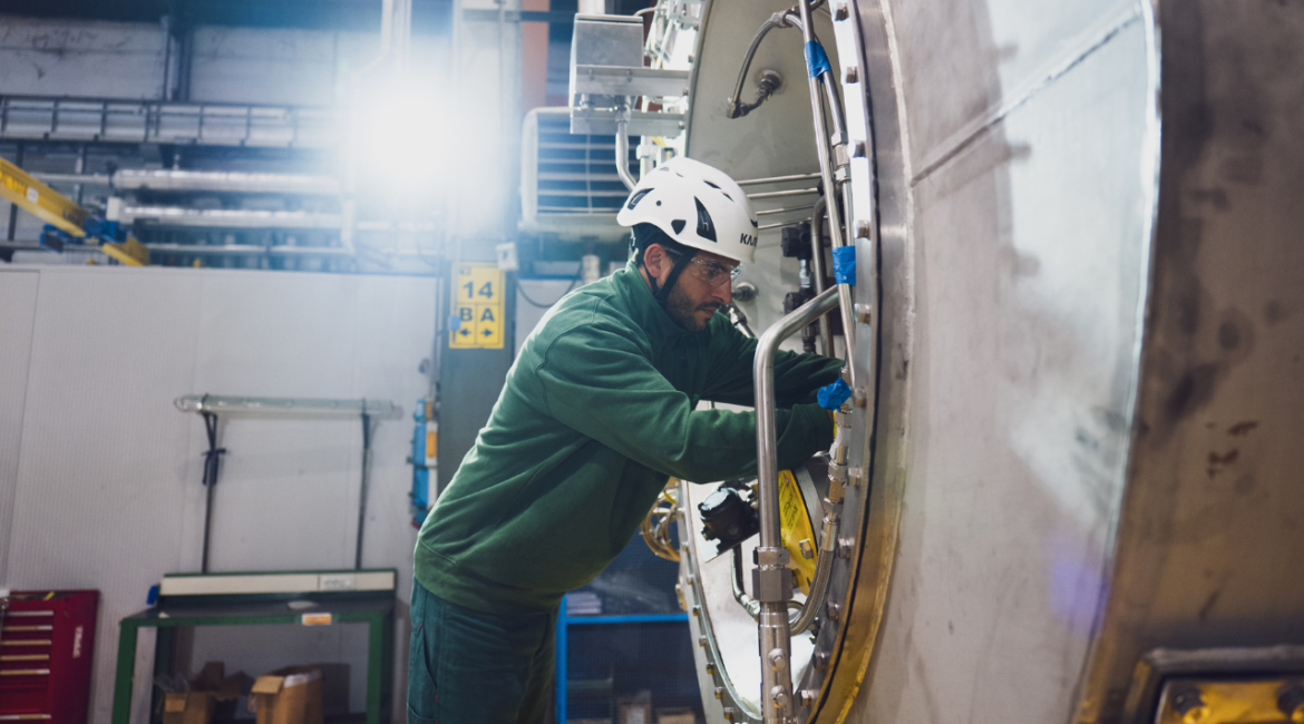 A worker at a factory in Florence, Italy, owned by Baker Hughes, an oil field service company that makes the kinds of turbines being used off grid, Nov. 26, 2025. Seeking power for data centers, Meta and other companies plan to use equipment that is expensive and polluting. (Clara Vannucci/The New York Times)