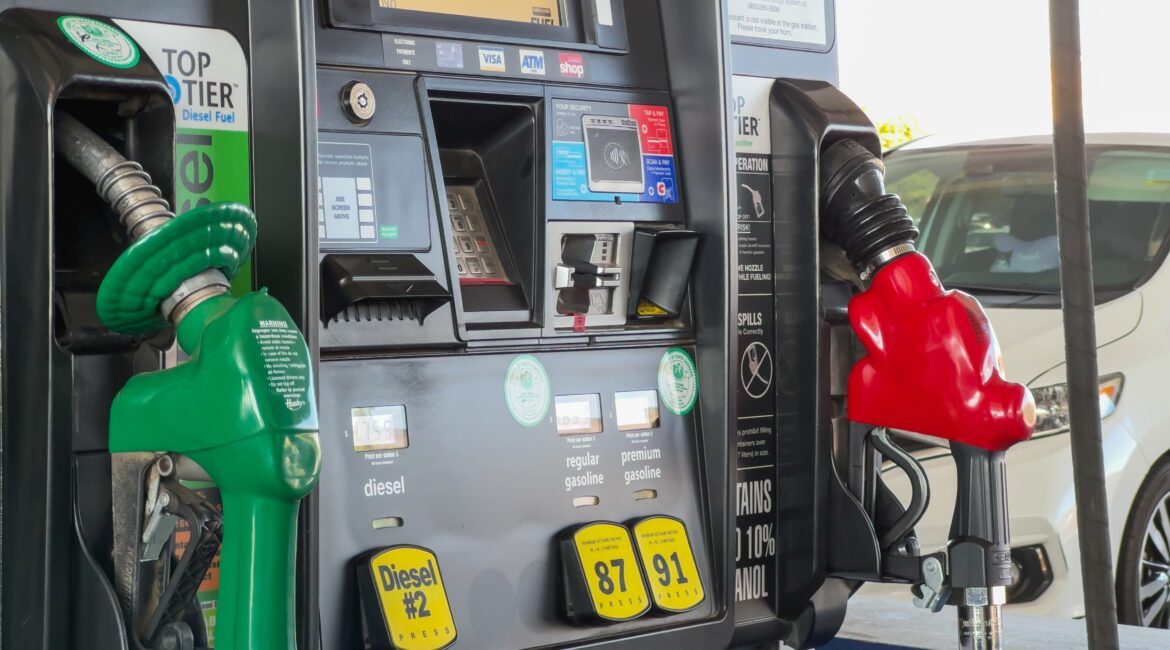 Image of gas pump with a green handle for diesel and red for gasoline