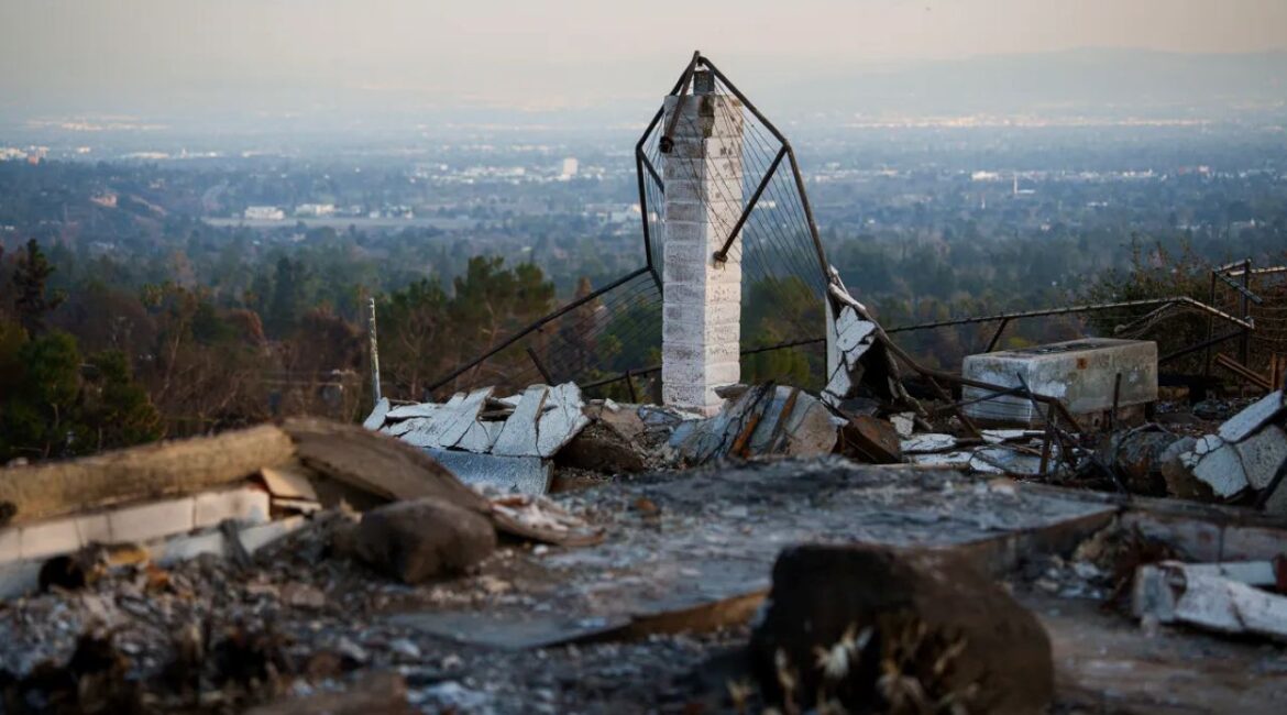 Image of the charred remains, a brick chimney, from the Easton Fire in Los Angeles