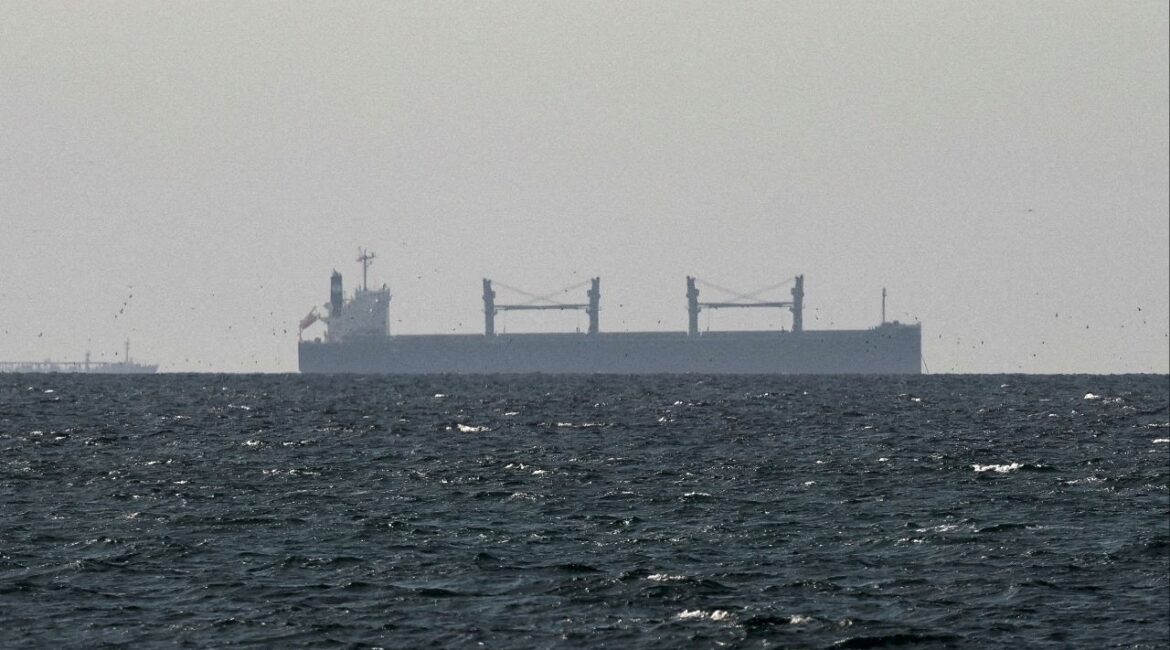 A cargo ship in the Gulf, near the Strait of Hormuz, as seen from northern Ras al-Khaimah, near the border with Oman’s Musandam governance, amid the U.S.-Israeli conflict with Iran, in United Arab Emirates, March 11, 2026. (Reuters File)