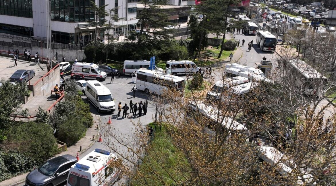 A drone view shows police officers and medics standing at the scene, after a gunfire was heard near the building housing the Israeli consulate, according to a witness, in Istanbul, Turkey, April 7, 2026. (Reuters/Mehmet Emin Caliskan)