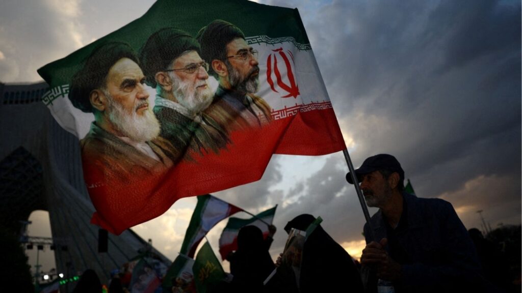 A man holds a flag during a rally in Tehran Wednesday, April 29, 2026. (Majid Asgaripour/WANA)