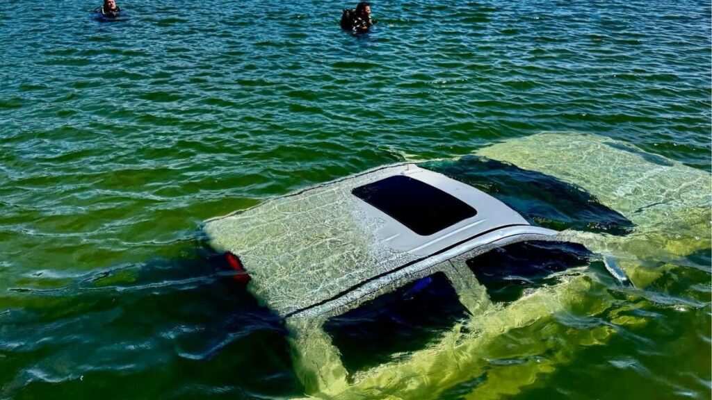 A pickup truck and empty jet ski trailer slid into Bass Lake at a boat ramp during a sheriff’s dive team training, but were later recovered without injuries or environmental damage. (Madera County SO)