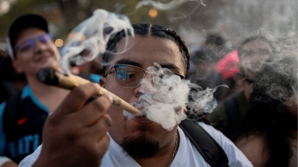 A reveller smokes cannabis at the Mile High 420 Festival in Denver, Colorado, U.S., April 20, 2026. (Reuters/Cheney Orr)