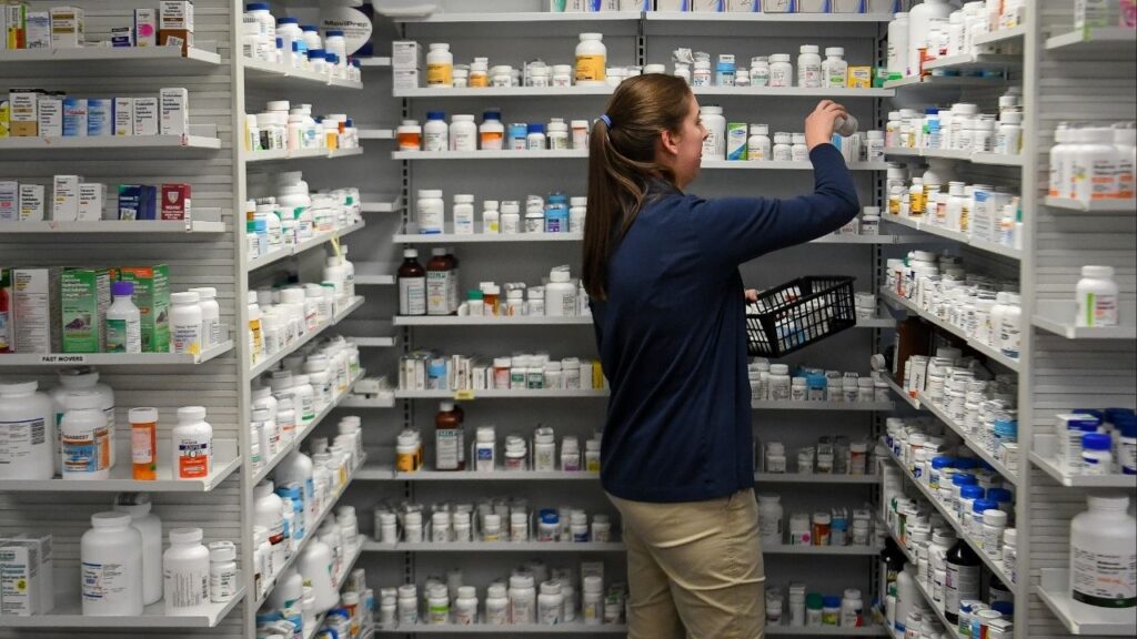A technician stocks the shelves of a pharmacy in this file photo in U.S., February 7, 2018. (Reuters File)