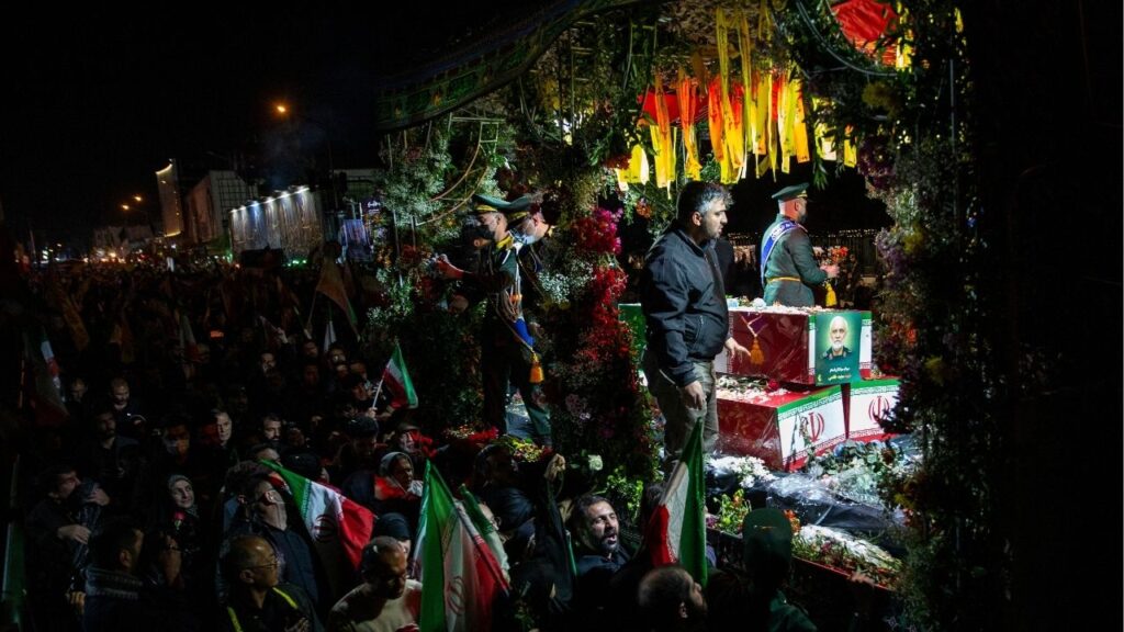 A truck carries the coffin of Major Gen. Majid Khademi, head of intelligence for Iran's paramilitary Revolutionary Guard, during his funeral procession in Tehran, Iran, April 8, 2026. (Arash Khamooshi/The New York Times)