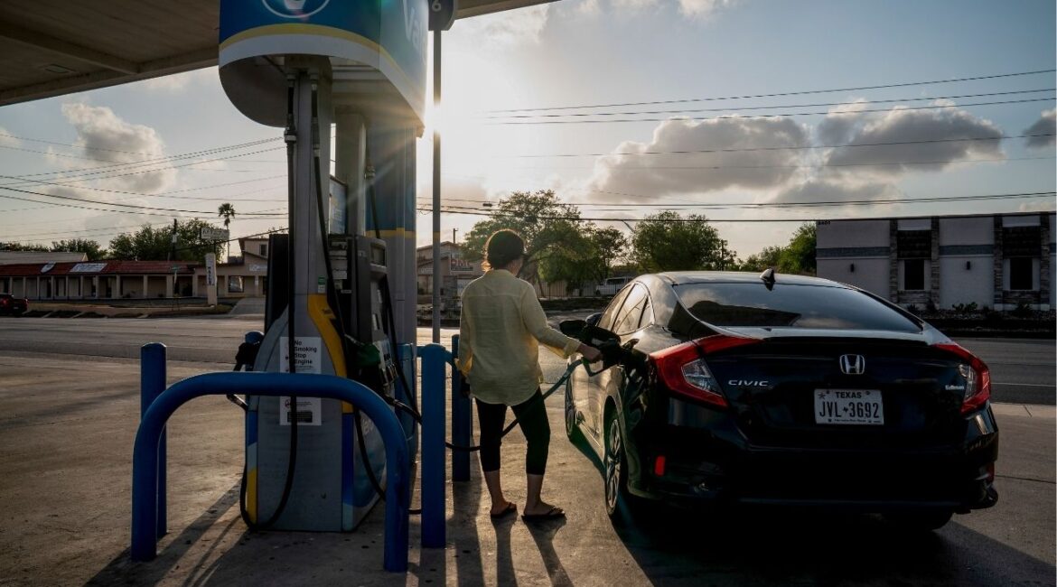 A woman pumps gas in Harlingen, Texas, March 28, 2026. The energy industry refers to the behavior of gasoline prices as “up like a rocket, down like a feather.” (Gabriel V. Cárdenas/The New York Times)