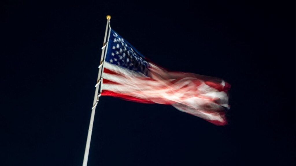 An American flag flutters on the South Lawn ahead of U.S. President Donald Trump's arrival at the White House, after Israel and the U.S. launched strikes on Iran, in Washington, D.C., U.S., March 1, 2026. (Reuters/Nathan Howard)