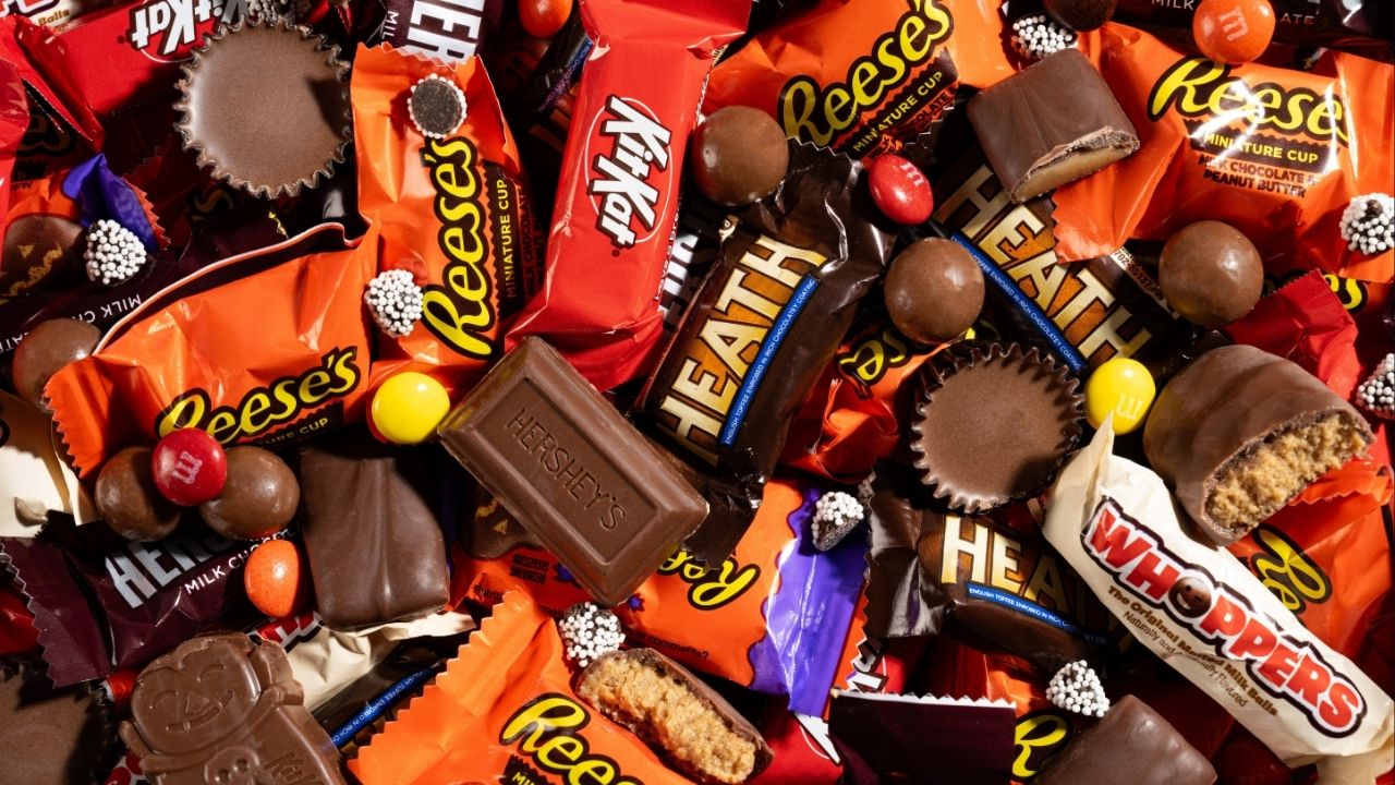 An assortment of Hershey’s candies, including Reese’s, is displayed in Chicago, Oct. 23, 2025. The Hershey Company said it would return to using “classic milk and dark chocolate recipes” in all of its products by 2027, adding that it was responding to consumer preferences. (Morgan Ione Yeager/The New York Times)
