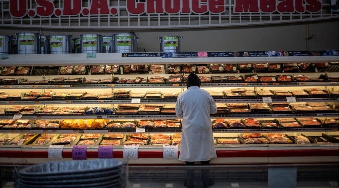 An employee stands at the meat section of a local supermarket located near a Tyson Foods meatpacking plant (not pictured), which is scheduled to shut down in the coming days, in Lexington, Nebraska, U.S. January 14, 2026. (Reuters File)