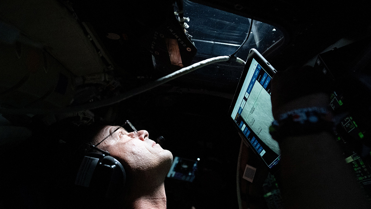 NASA astronaut and Artemis II Commander Reid Wiseman takes a moment during the seven-hour lunar observation period where the crew reported to the ground team their observations including color nuances, which will help enhance scientific understandings of the Moon, April 6, 2026. (NASA/Handout via Reuters)