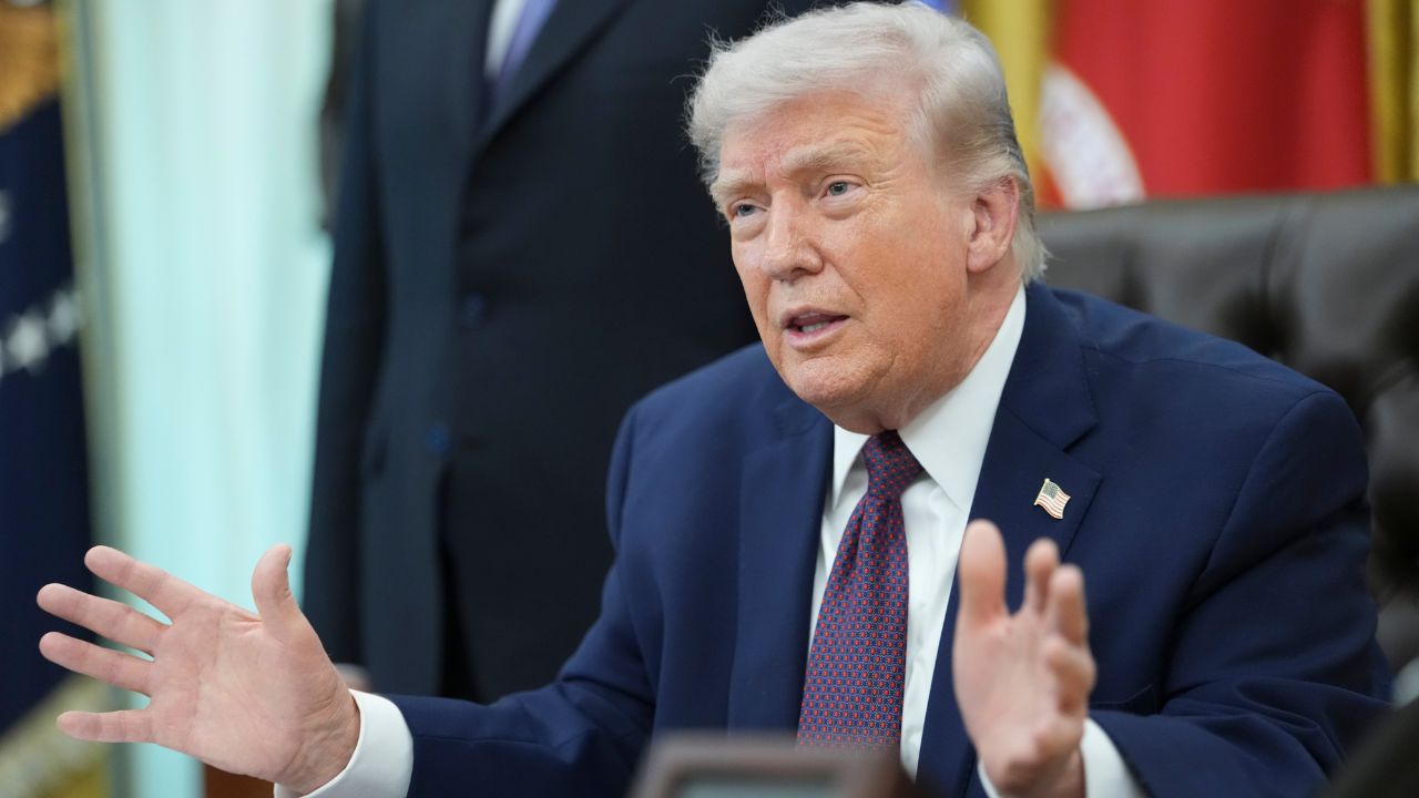 President Donald Trump takes questions from reporters after signing an executive order in the Oval Office of the White House in Washington, March 31, 2026. Bank of New York Mellon and the brokerage Robinhood will work with the federal government to implement the so-called Trump accounts, a tax-sheltered savings system for children, the Treasury Department said on Monday, April 6, 2026. (Doug Mills/The New York Times)