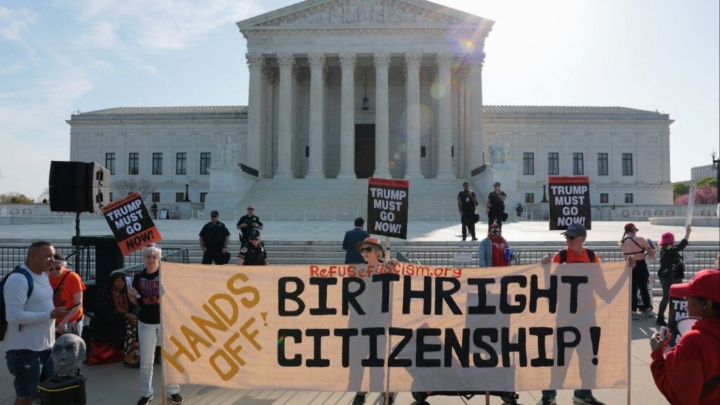 Demonstrators hold signs outside the U.S. Supreme Court building on the day the court is expected to hear oral arguments on the legality of the Trump administration's effort to limit birthright citizenship for the children of immigrants, in Washington, D.C., U.S., April 1, 2026. (Reuters/Kylie Cooper)