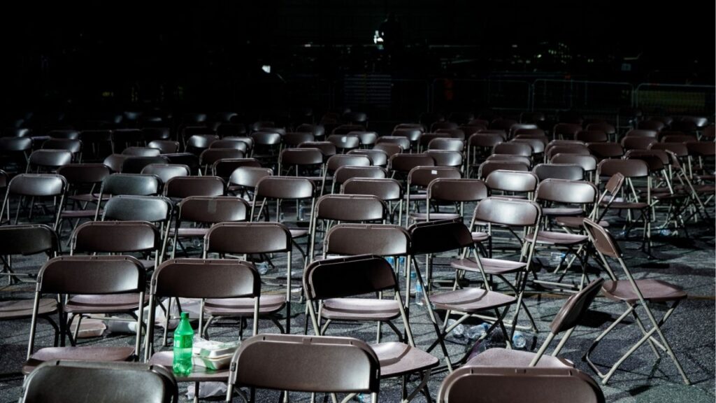 Empty chairs at a rally for Republican Senate candidates before two key run-offs, that was attended by President Donald Trump in the last months of his first term, in Valdosta, Ga., on Dec. 5, 2020. (Damon Winter/The New York Times)
