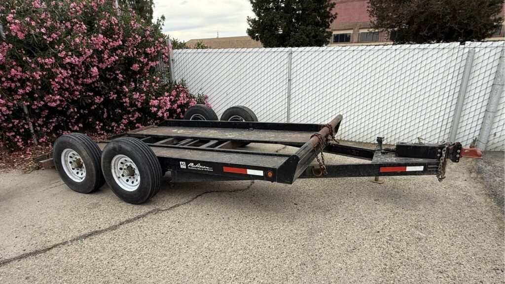 Fresno County authorities are seeking the owner of a stolen agricultural trailer recovered in the Sanger or Selma area, identifiable by modified axle arms and new tires. (Fresno County SO)