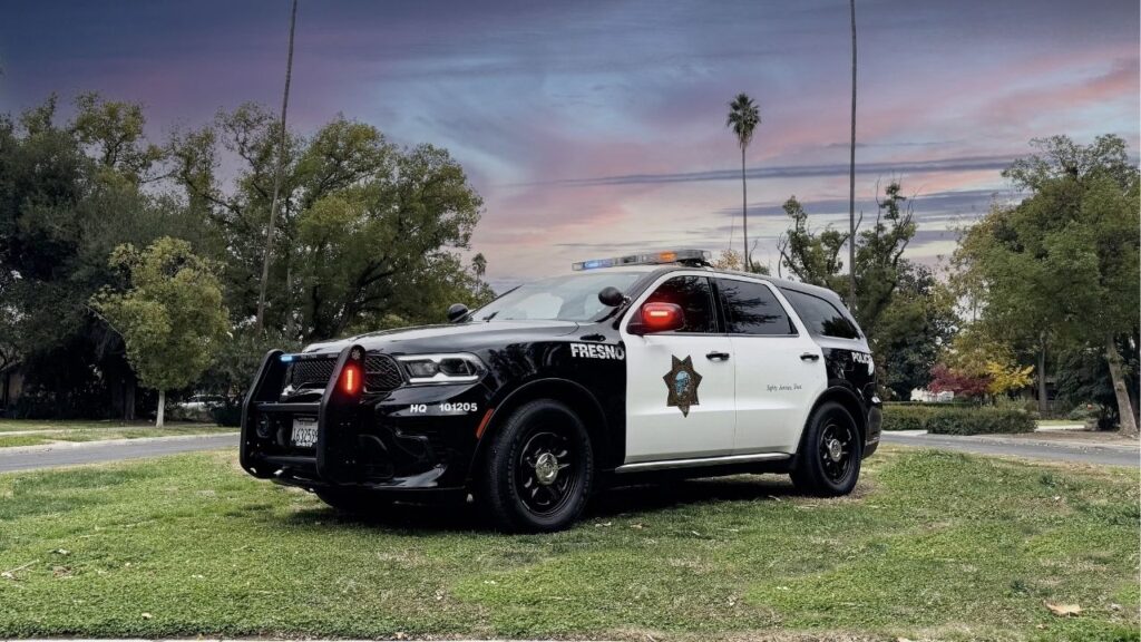 Fresno police arrested a 26-year-old man after finding a stolen Glock handgun equipped with an automatic conversion device during a probation search on Friday, April 17, 2026. (Fresno PD)