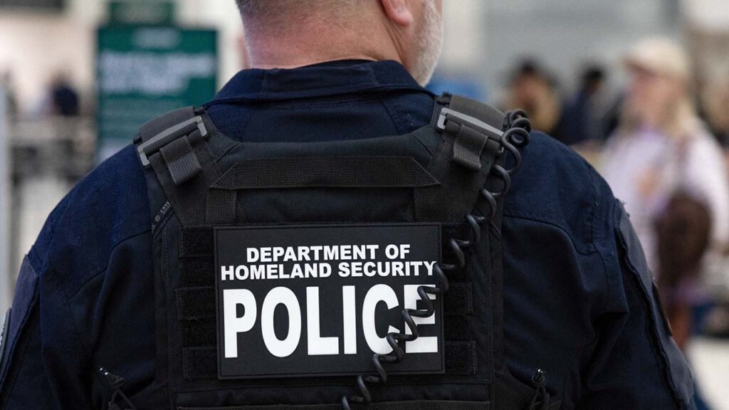 A Department of Homeland Security officer directs passengers as they wait in long TSA lines at the George Bush Intercontinental Airport in Houston, Texas, U.S., March 25, 2026. (Reuters/File Photo)