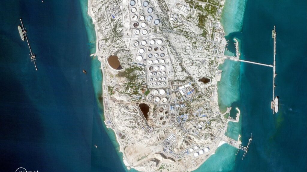 In an image provided by Planet Labs, part of Kharg Island, Iran’s oil export hub, before U.S. and Israeli strikes. The United States launched a series of more than 90 strikes on Kharg Island, early on Tuesday, April 7, 2026. (Planet Labs via The New York Times)