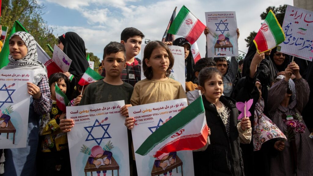 Image of Iranian children attending a memorial for elementary school victims killed by an American missile