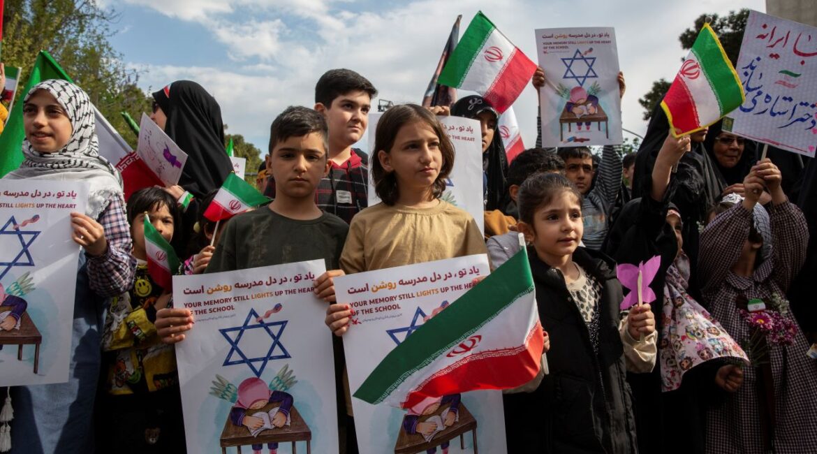 Image of Iranian children attending a memorial for elementary school victims killed by an American missile