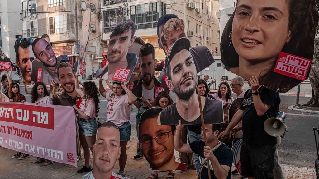 Demonstrators advocate for the return of remaining Israeli hostages taken by Hamas on Oct. 7, 2023, outside the headquarters of the governing Likud party in Tel Aviv, Israel, June 21, 2025. Many Israelis are angry and frustrated over the Netanyahu government because of the Hamas-led attack in 2023. (Daniel Berehulak/The New York Times)