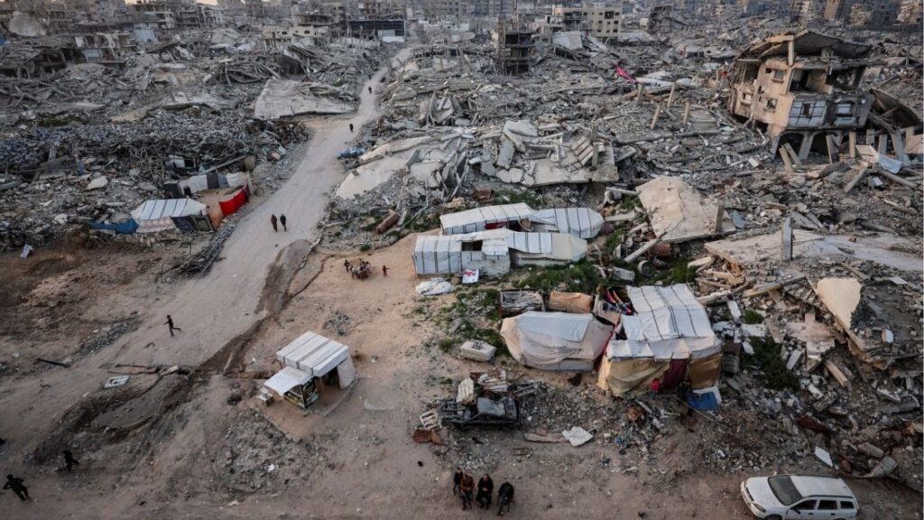 Palestinians gather near the rubble of residential buildings destroyed during the two-year Israeli offensive, on the first day of the holy month of Ramadan, in Gaza City, February 18, 2026. (Reuters File)