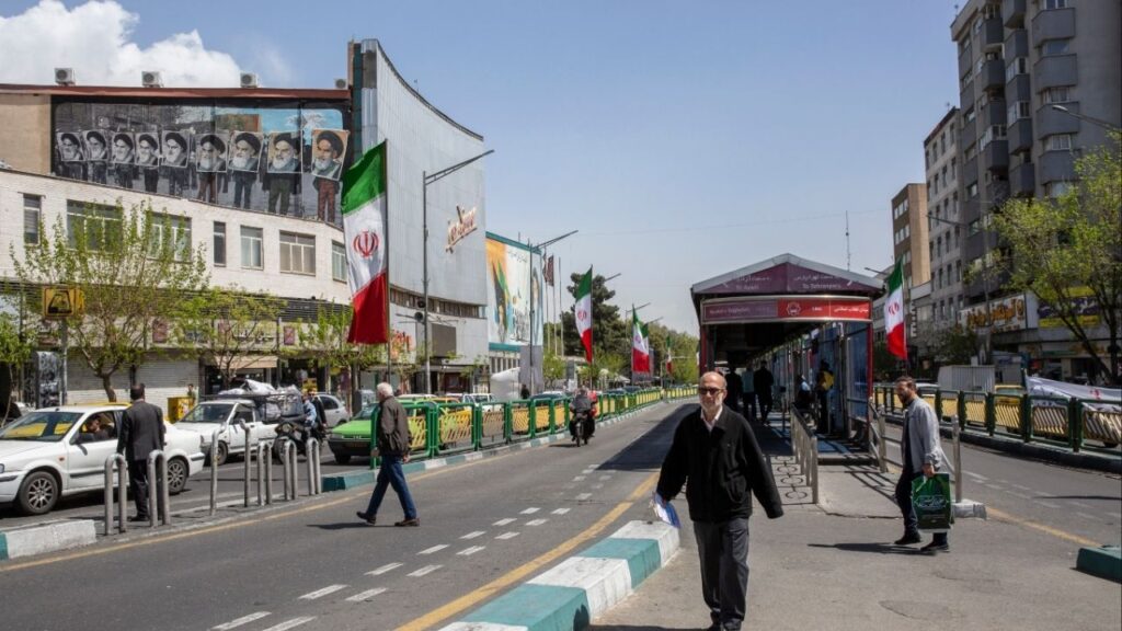 People on a street in Tehran, April 5, 2026. The intelligence chief of the Islamic Revolutionary Guards Corps was killed overnight on Monday, the latest blow to senior Iranian leadership since the United States and Israel began the war against Iran in late February. (Arash Khamooshi/The New York Times)