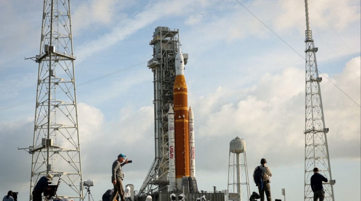 People set cameras to photograph NASA's Artemis II lunar flyby mission, with the next-generation moon rocket, the Space Launch System (SLS) rocket and the Orion crew capsule, on Pad 39B, ahead of the launch of the Artemis II mission at the Kennedy Space Center in Cape Canaveral, Florida, U.S., March 31, 2026. REUTERS/Brendan McDermid
